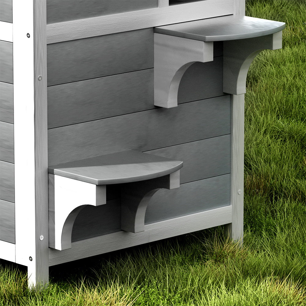Grey and white two-tier wooden outdoor cat house with asphalt roof and viewing windows — view 3