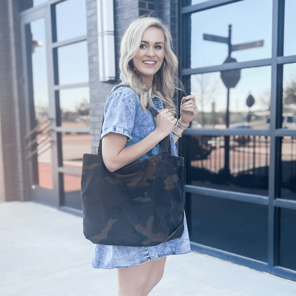 Kristy canvas tote bag in green camo print featuring vintage styling and durable shoulder straps