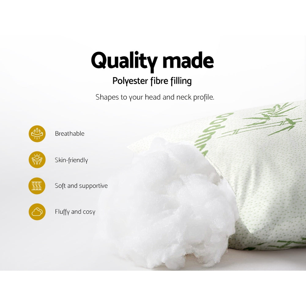 Four white bamboo fabric pillows stacked together with two firm and two medium support variations — view 5