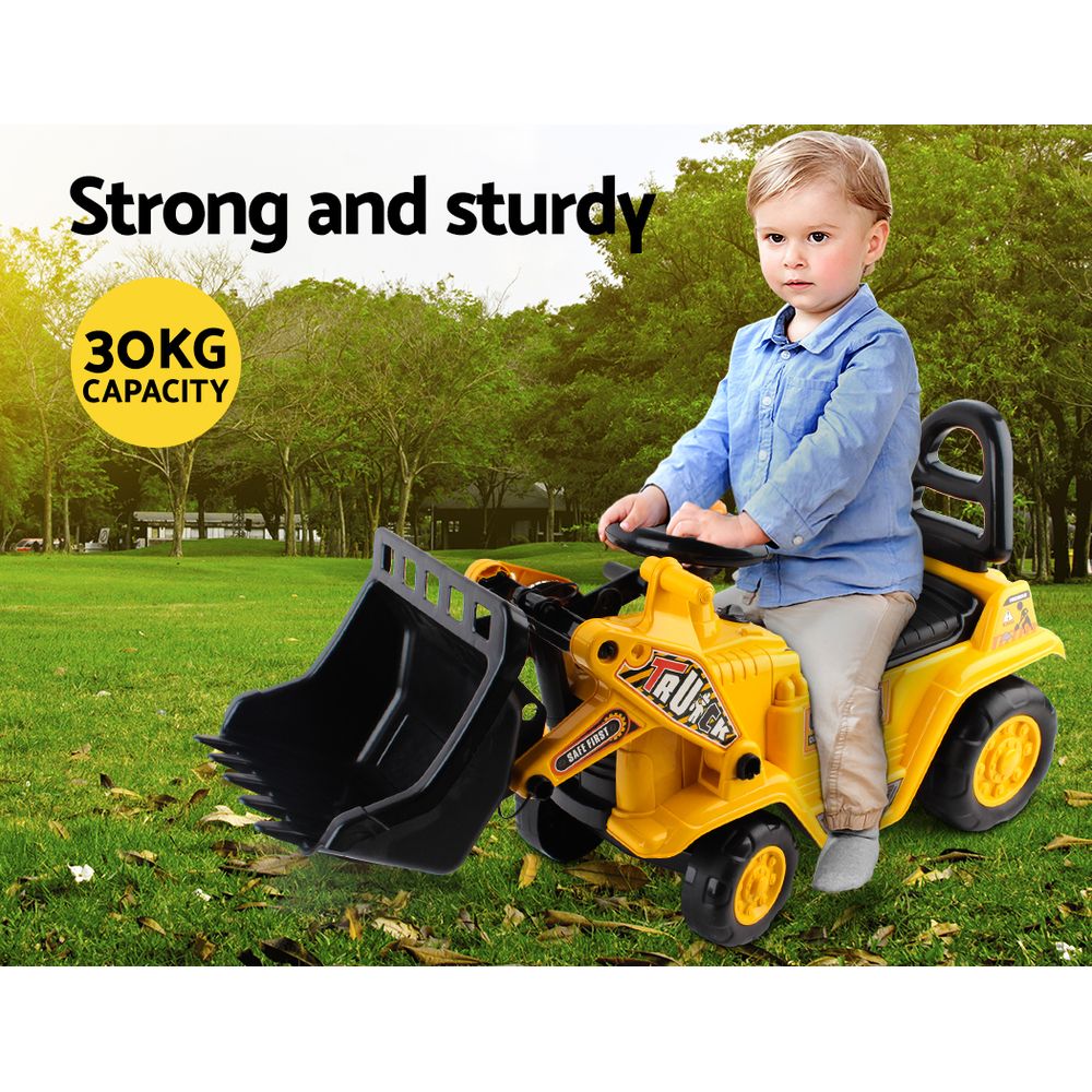 Yellow kids ride-on excavator bulldozer toy with bucket lever, under-seat storage, and matching safety helmet — view 3