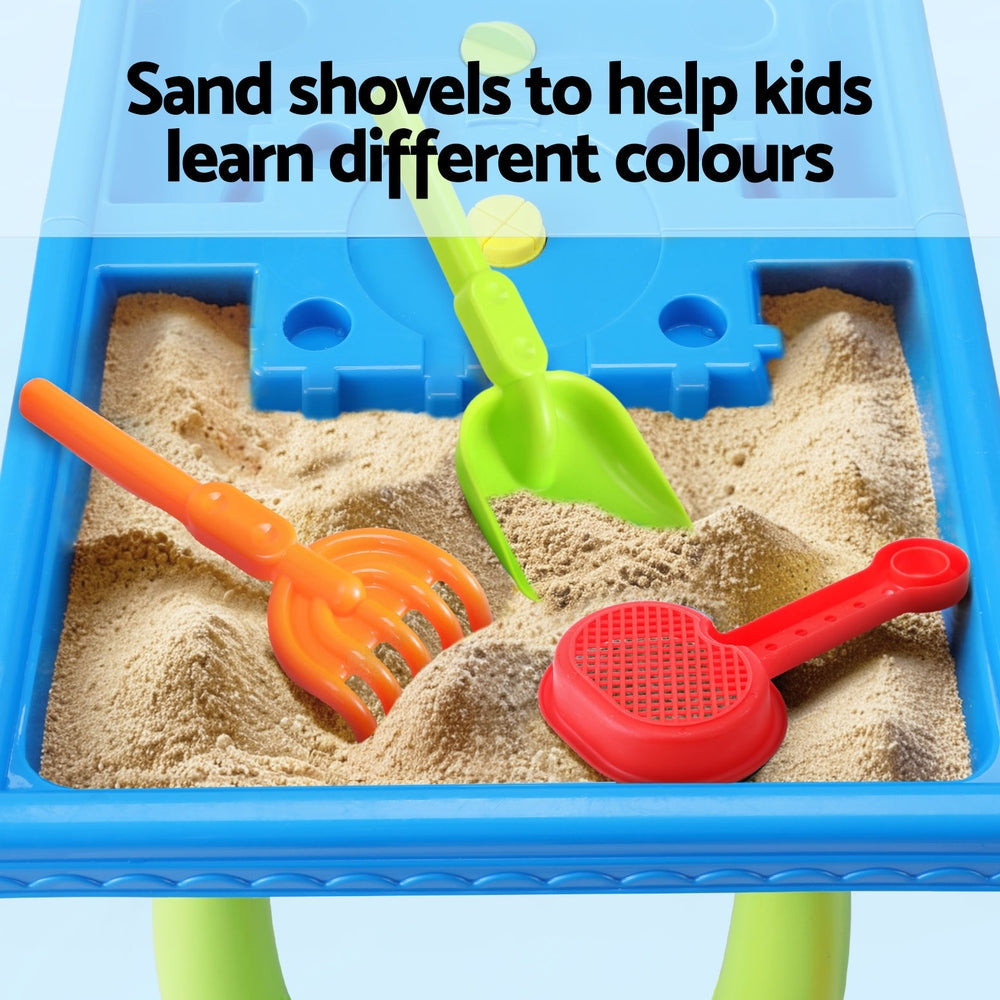 Multicolor kids sand and water play table with rotating windmill, water slide, and toy shovels. — view 5