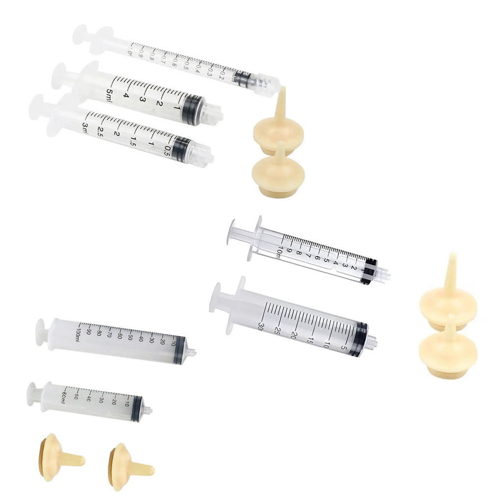 Transparent pet feeding syringe kit with beige silicone nursing nipples in various sizes — view 2
