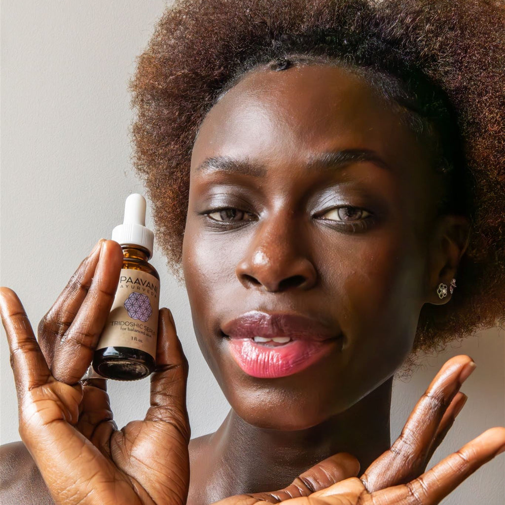 Tridoshic face serum in an earth-friendly amber glass bottle with a dropper cap — view 4