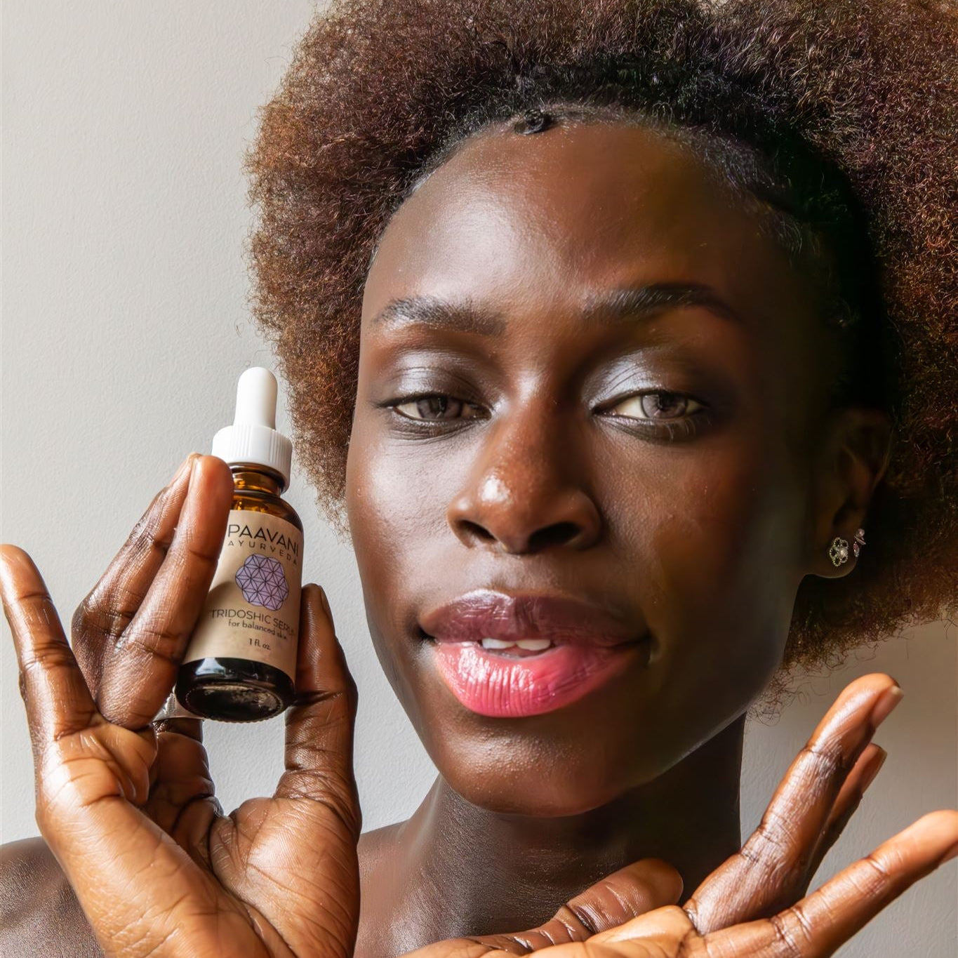 Tridoshic face serum in an earth-friendly amber glass bottle with a dropper cap — view 4