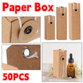 Kraft paper cosmetic packaging boxes holding small essential oil and perfume glass bottles