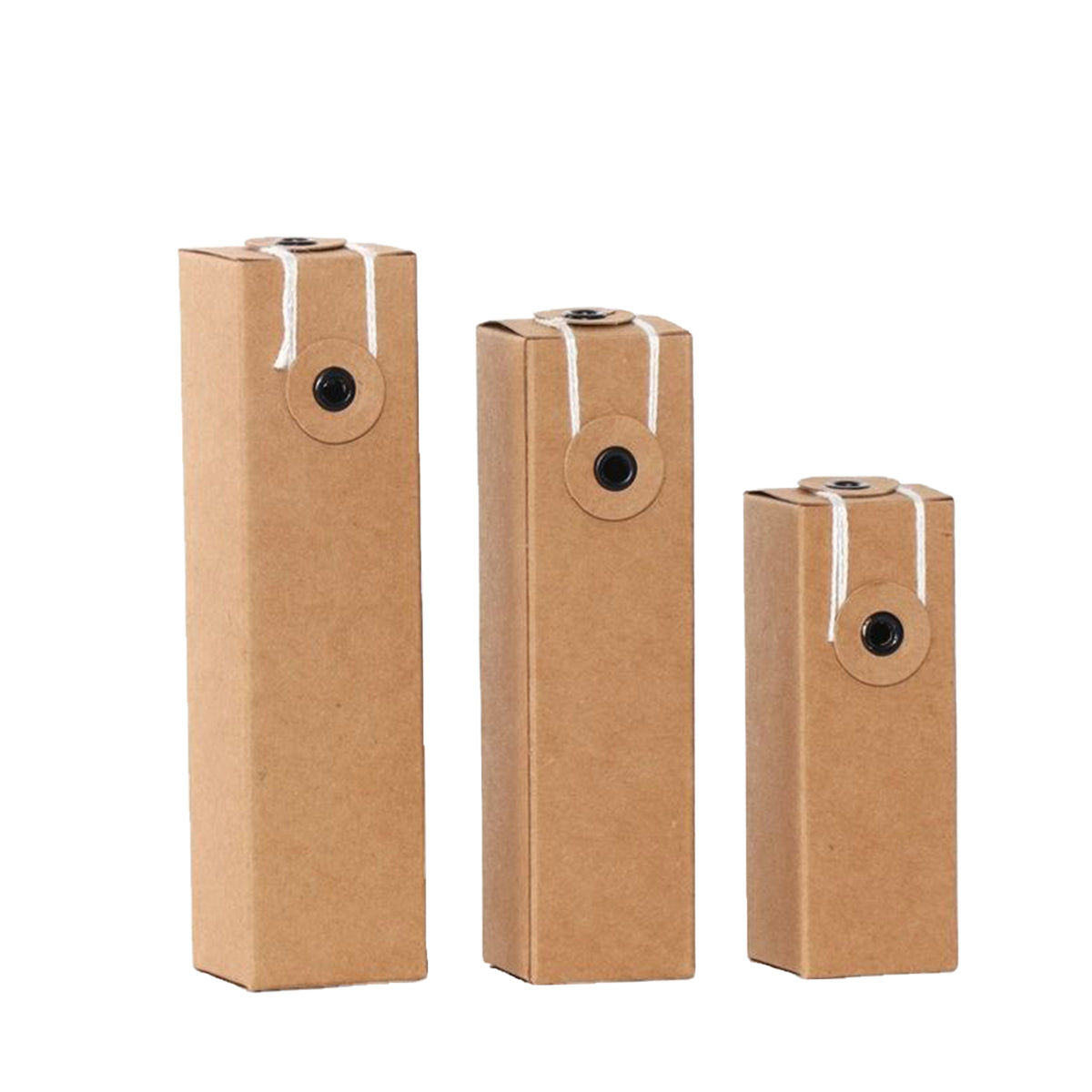 Kraft paper cosmetic packaging boxes holding small essential oil and perfume glass bottles — view 2