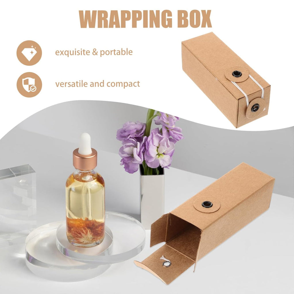 Kraft paper cosmetic packaging boxes holding small essential oil and perfume glass bottles — view 4