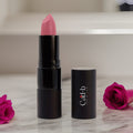 Vegan rose lipstick in eco-friendly recyclable packaging showing a creamy hydrating finish