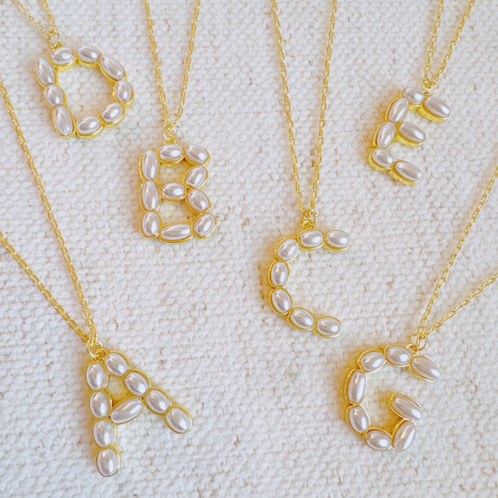 Pearl mosaic initial pendant necklace in 18k gold-plated brass with delicate pearl accents on chain — view 4