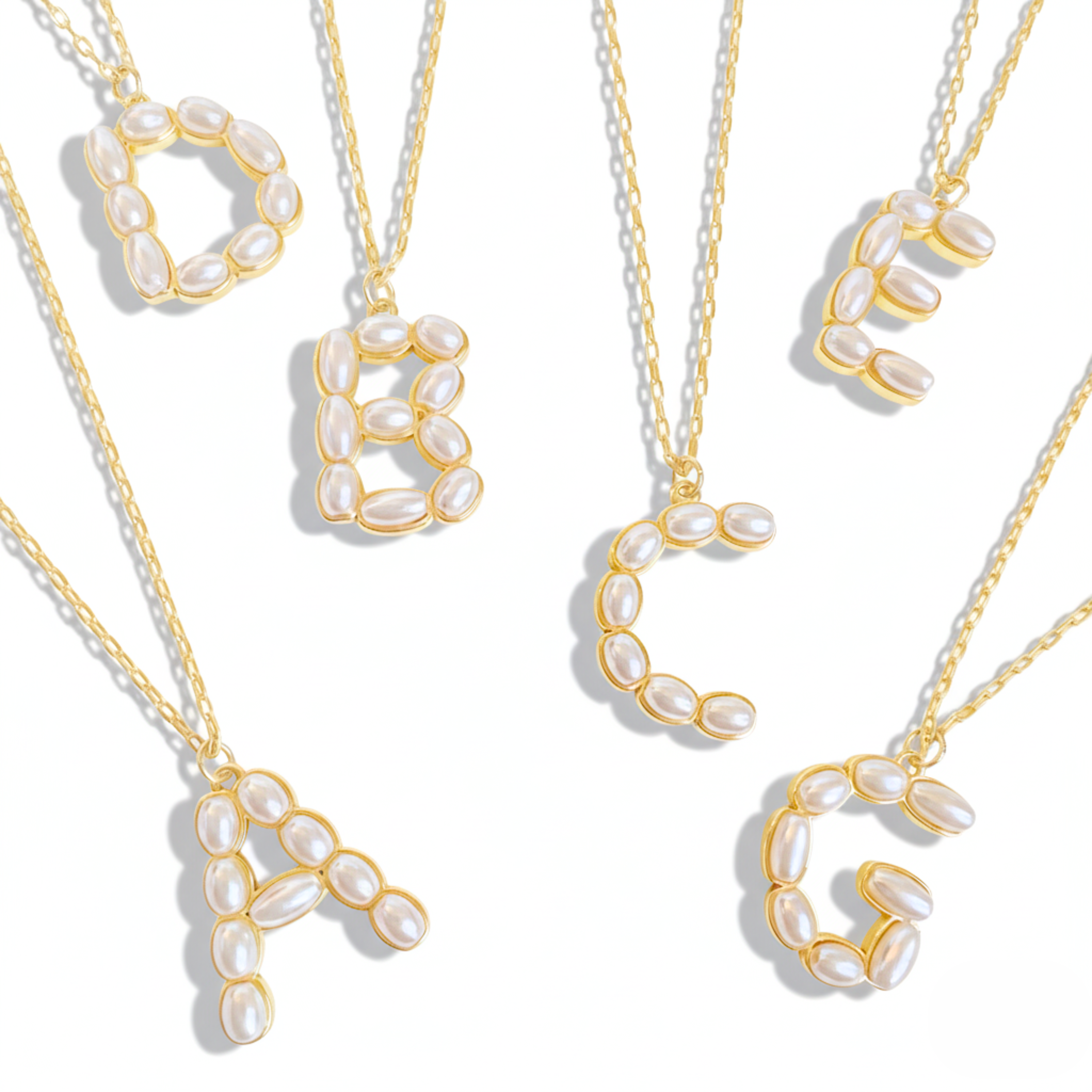 Pearl mosaic initial pendant necklace in 18k gold-plated brass with delicate pearl accents on chain