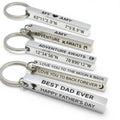 Personalized 3D bar keychain in matte black stainless steel with four-sided custom text engraving