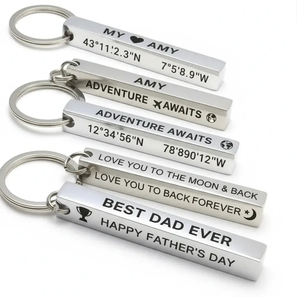 Personalized 3D bar keychain in matte black stainless steel with four-sided custom text engraving