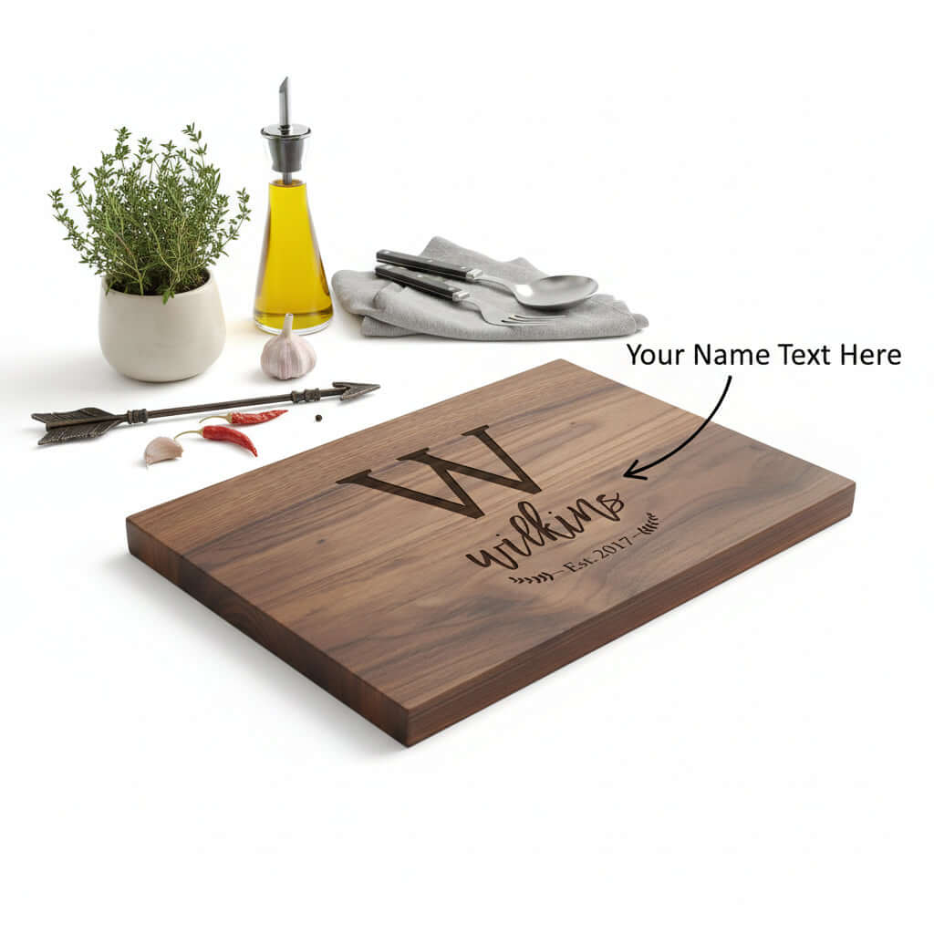 Personalized dark walnut wood cutting board with custom engraving resting on a modern kitchen counter