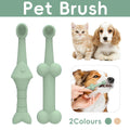Two double-sided silicone pet toothbrushes in green and yellow for dog and cat dental hygiene