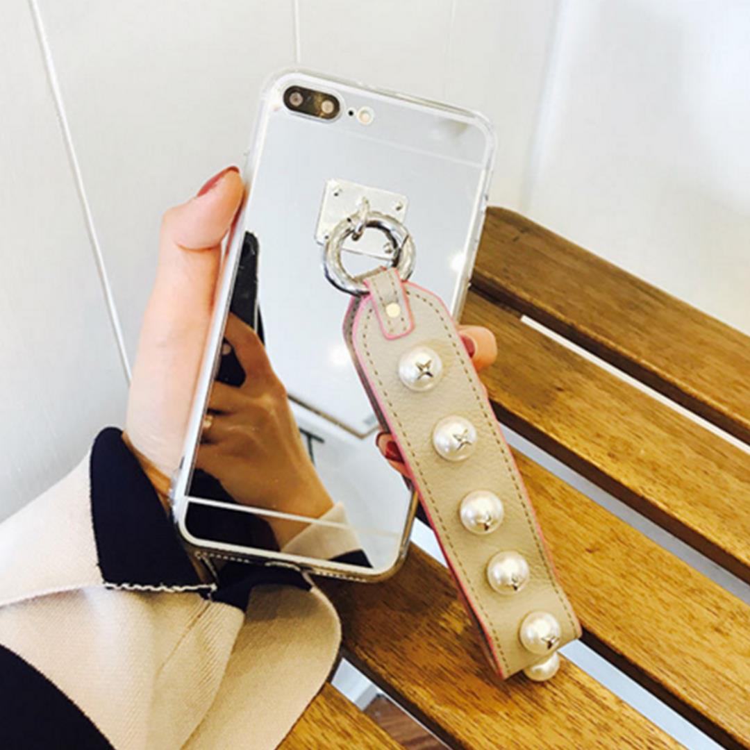 Luxury silver mirror back iPhone case featuring a durable and shockproof hard shell exterior design — view 4