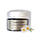 Hakumai rice protein arbutin face cream in a minimalist white cosmetic jar with natural botanical ingredients