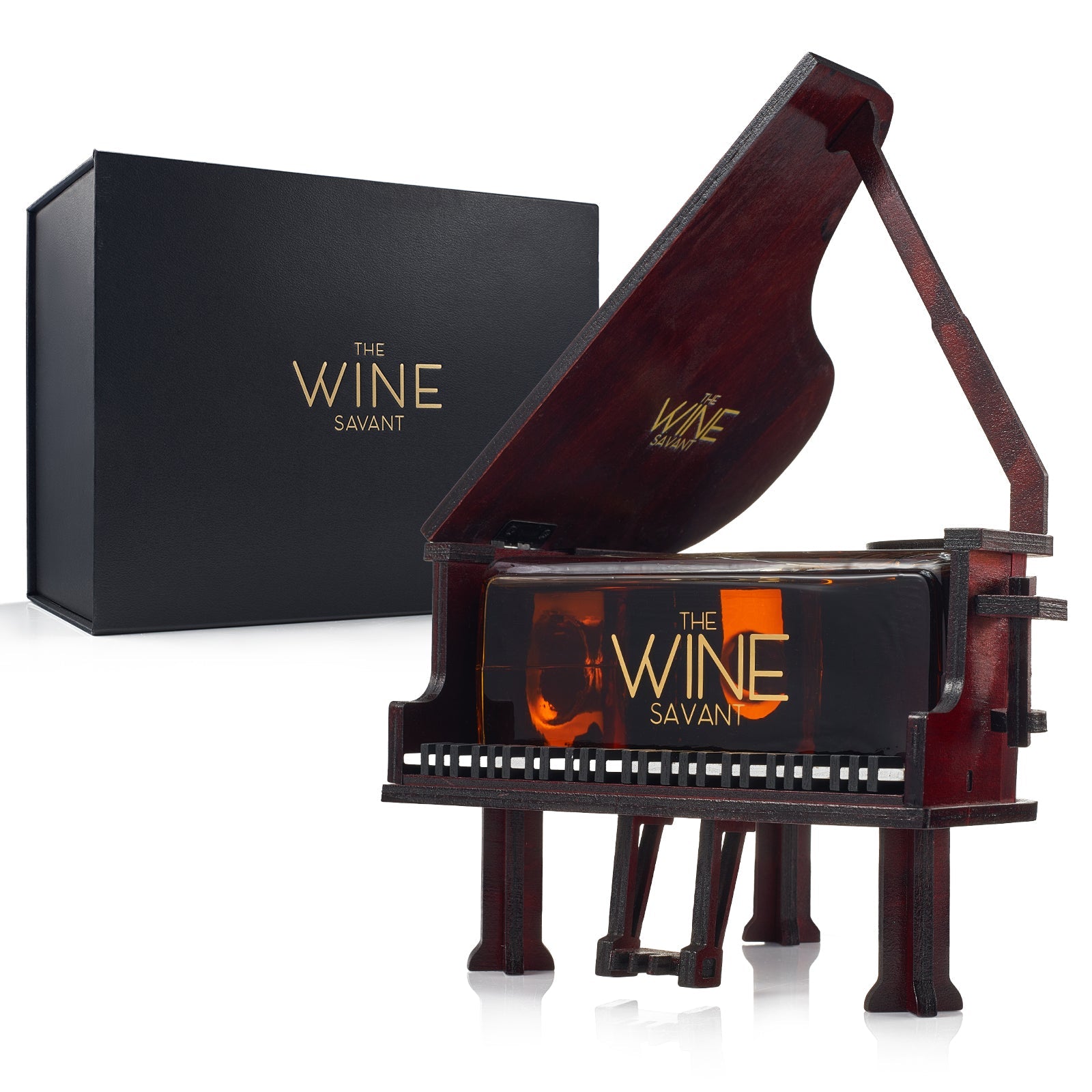 Piano shaped whiskey decanter crafted from mahogany wood with lifting lid and internal glass dispenser