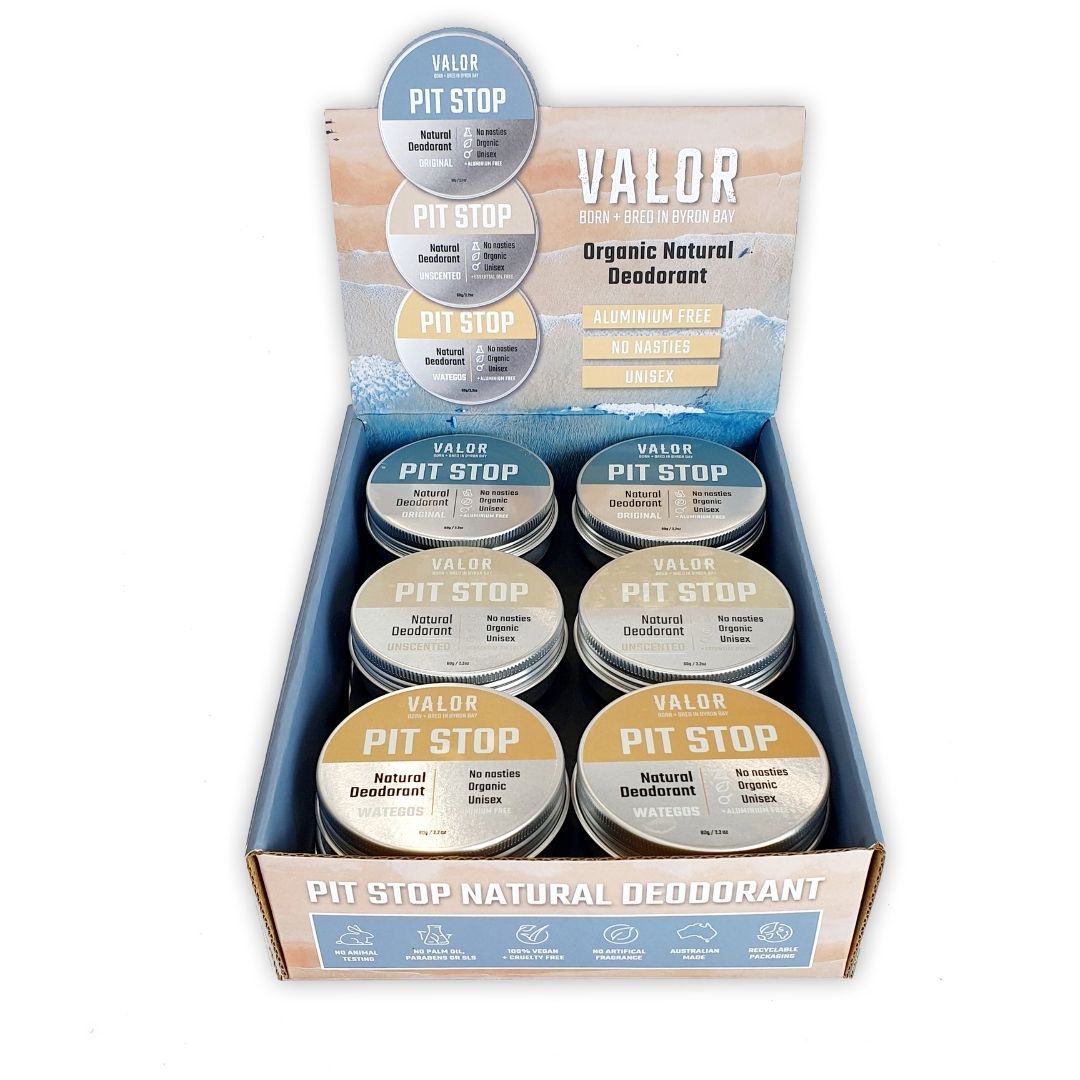 Twelve mixed Valor Organics natural deodorant tins in a beautifully arranged countertop display box