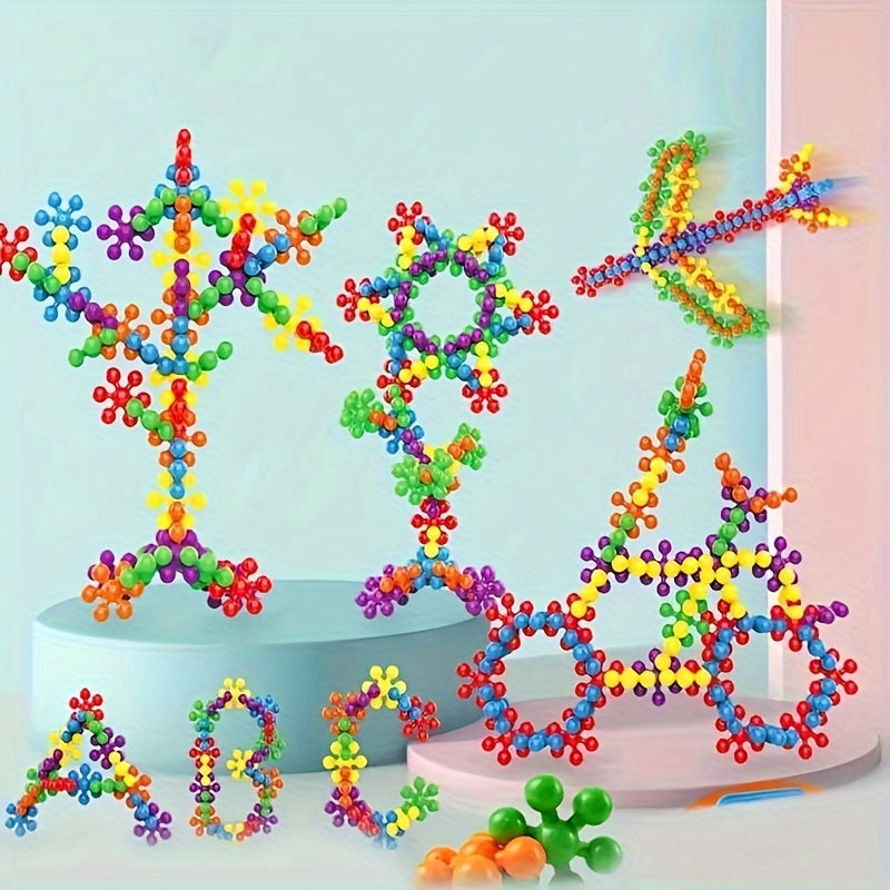 Vibrant Plum Blossom 3D snowflake building blocks connected together in a creative children's play structure — view 5
