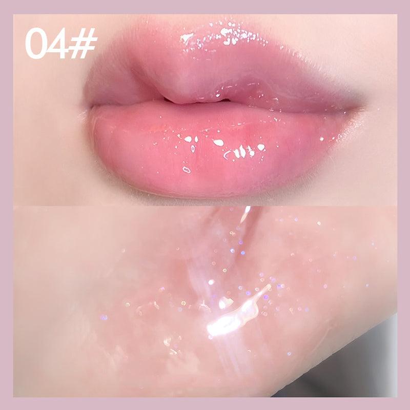 Plumping pink lip gloss tube with holographic shine highlighting a nourishing and volumizing cosmetic formula — view 5