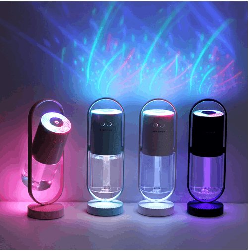 Sleek polymer mist portable air humidifier and purifier emitting fine moisture on a desk — view 2