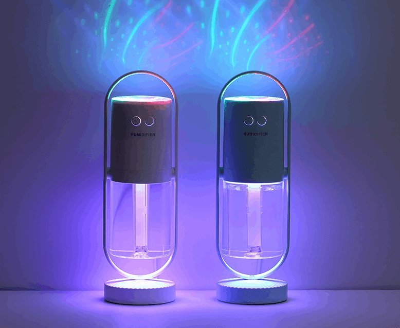 Sleek polymer mist portable air humidifier and purifier emitting fine moisture on a desk — view 3