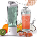 Portable blender juicer with 6 blades 600ml travel cup and USB Type-C charging port.
