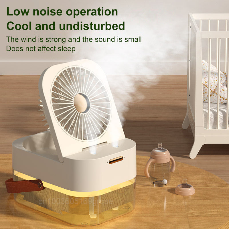 Portable humidifier fan with double misting nozzles, night light, and remote control on a desk — view 3