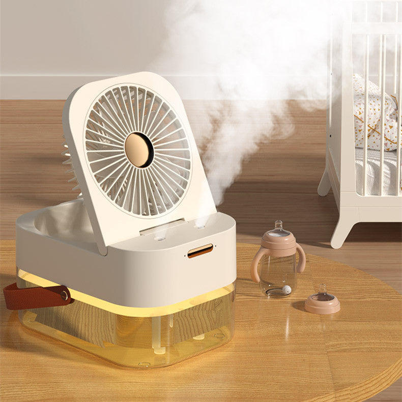 Portable humidifier fan with double misting nozzles, night light, and remote control on a desk — view 5