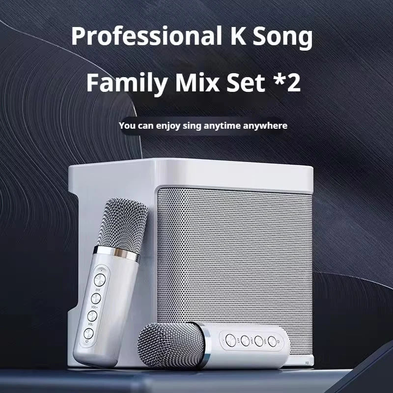 White portable dual microphone karaoke speaker system with two wireless mics and compact base — view 2