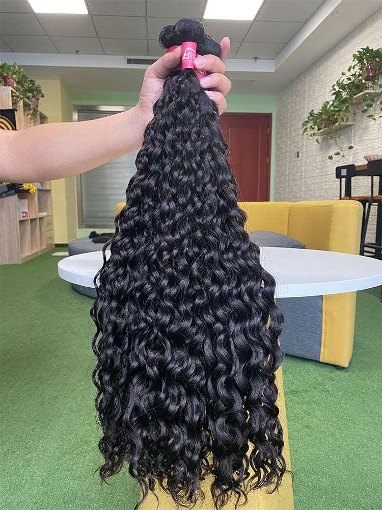 Premium human hair extensions in natural color showing smooth tangle free texture and healthy ends — view 2