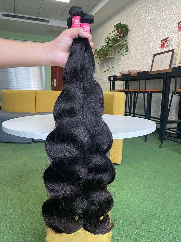 Premium human hair extensions in natural color showing smooth tangle free texture and healthy ends — view 5