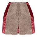 Beige structured wool mini skirt with bold front zipper and burgundy silk cotton insets.