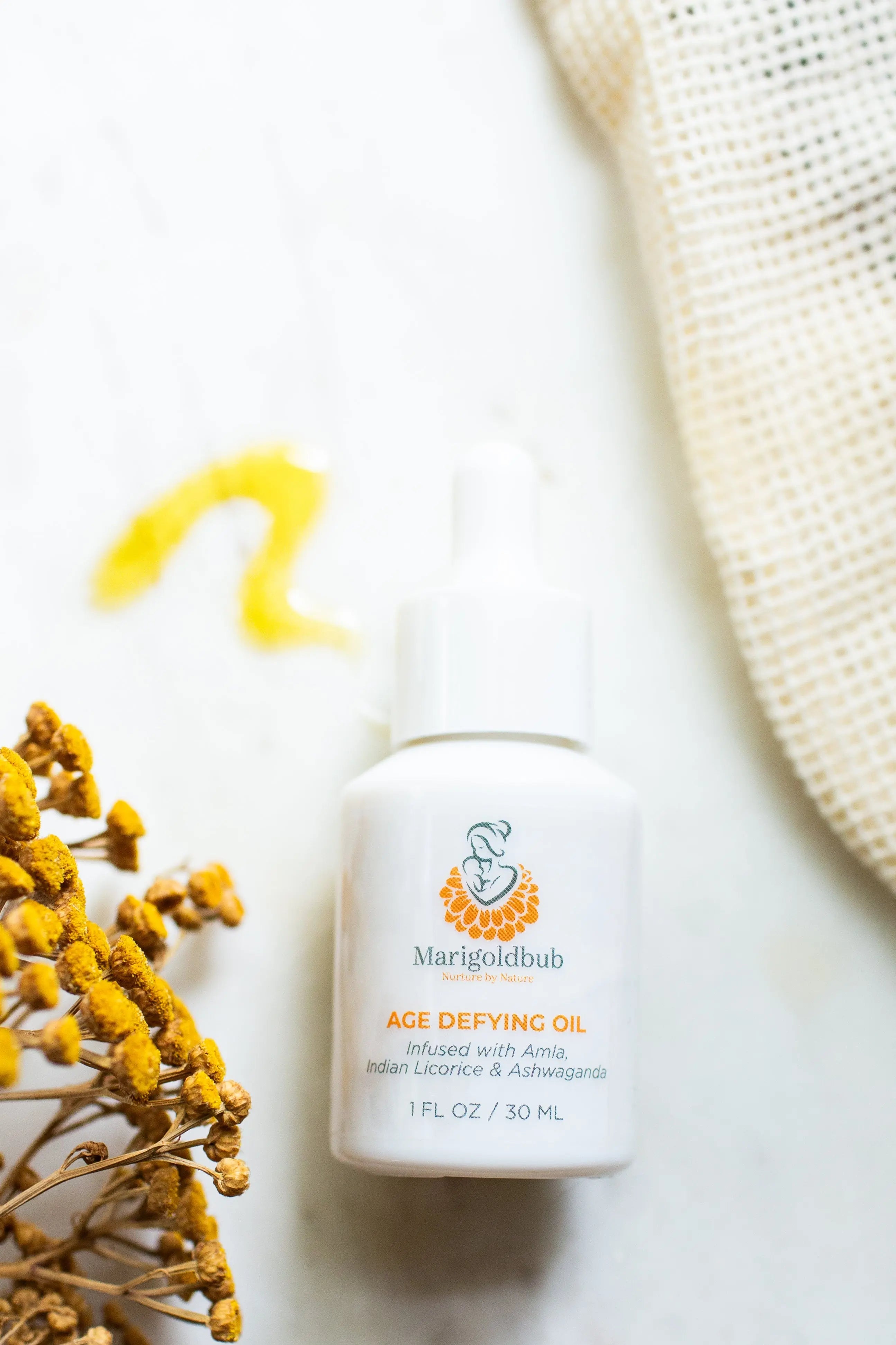 Age Defying Face Oil in a premium eco-friendly glass bottle with an easy application dropper.