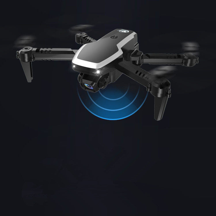 Professional 4K mini drone with dual cameras and remote control next to travel storage bag — view 2