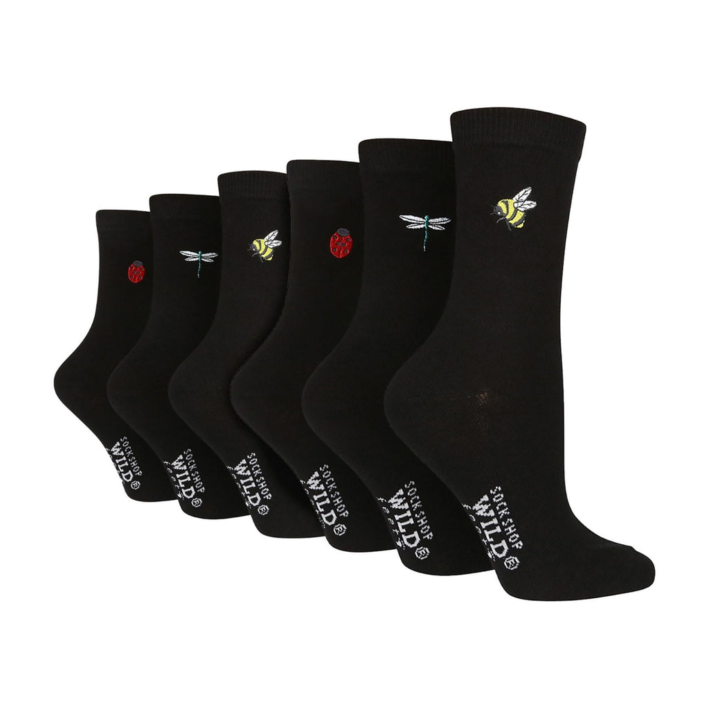 Six pair multipack of black ladies cotton crew socks with quirky embroidered novelty designs