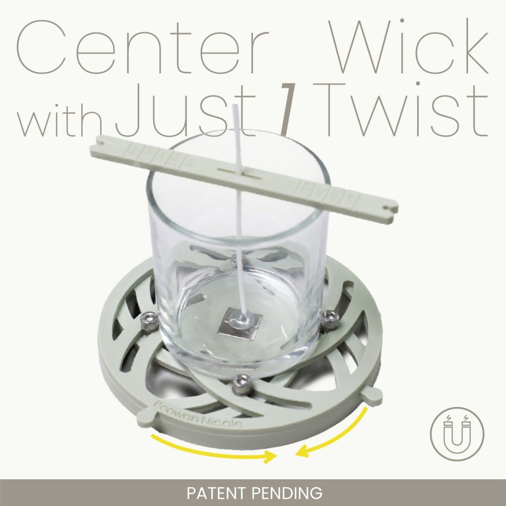 Pro magnetic candle wick centering tool securing a wick inside a glass jar vessel