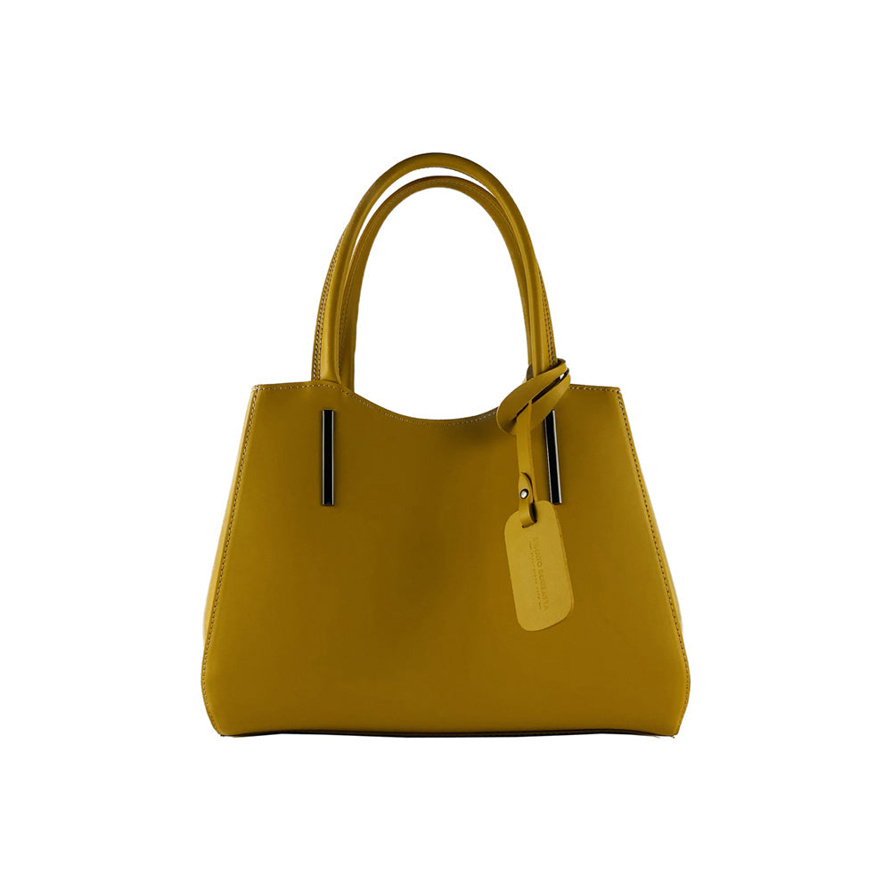 Mustard genuine leather handbag with gunmetal hardware, top handles, and a removable shoulder strap