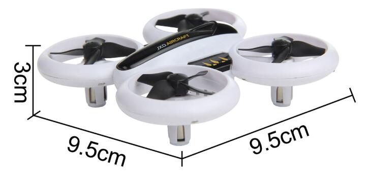 Remote control quadcopter drone with protective guards and bright LED lights ready for flight — view 3