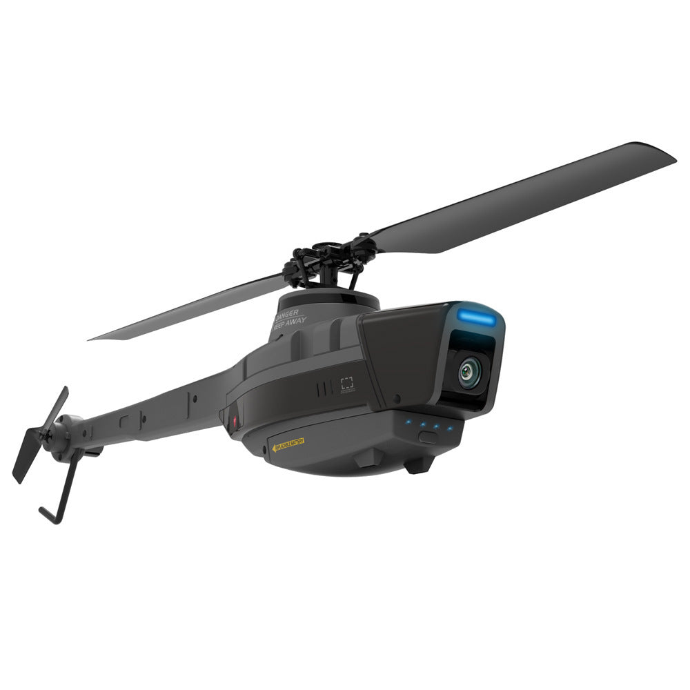 Mini RC helicopter with camera in grey plastic, featuring four propellers and flybarless design. — view 4