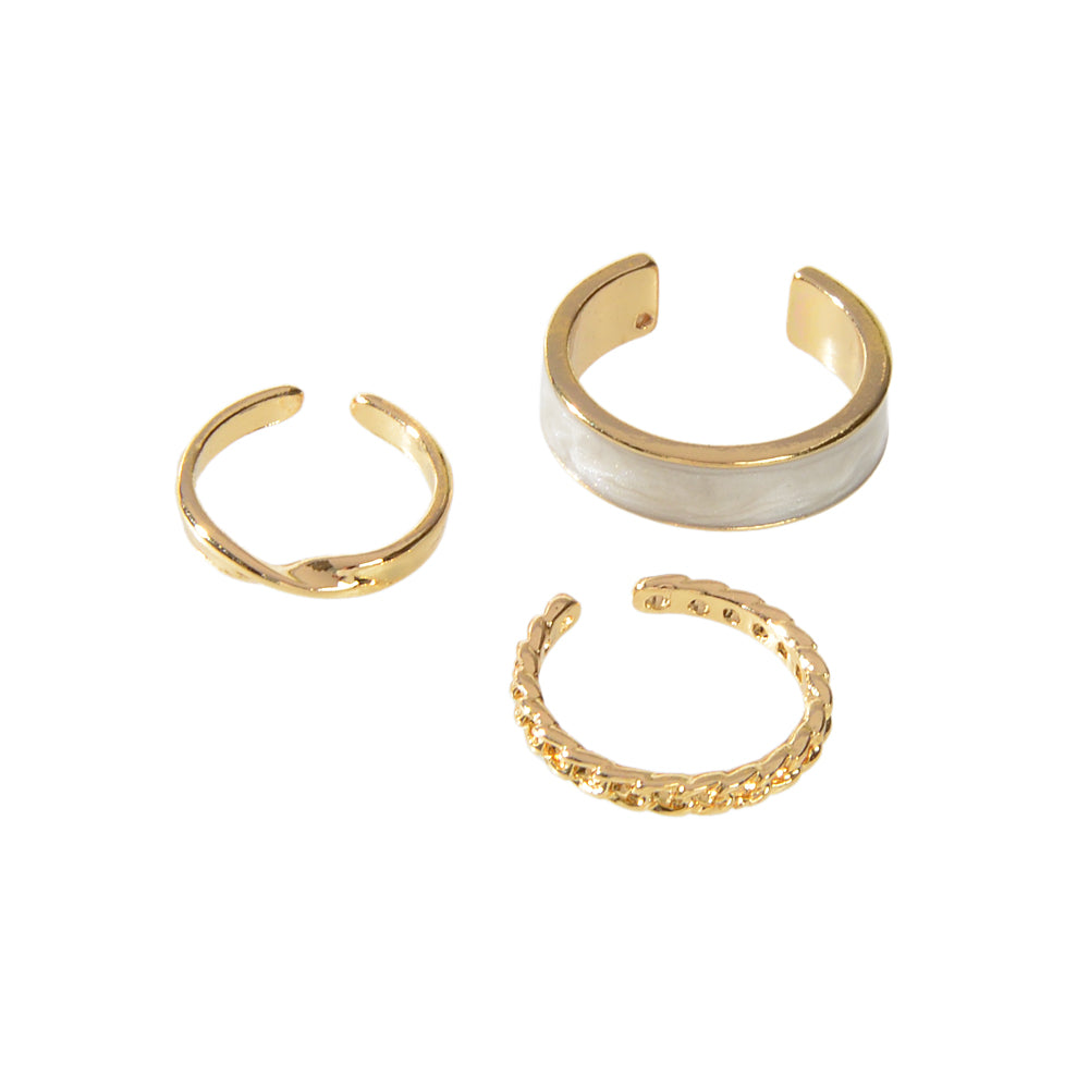 Three piece retro stackable white enamel midi knuckle ring set displayed together — view 5