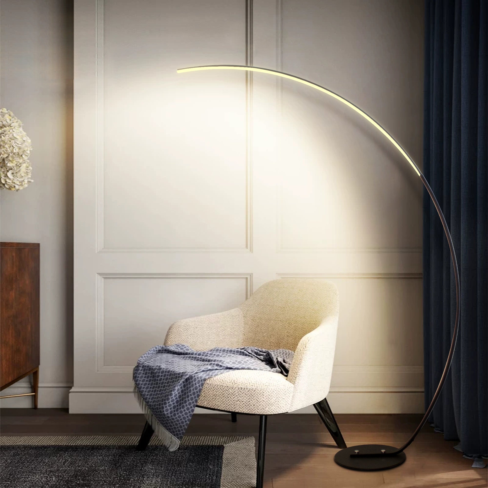 Modern RGBW curved floor lamp with metal arc emitting vibrant color changing light in living room — view 4