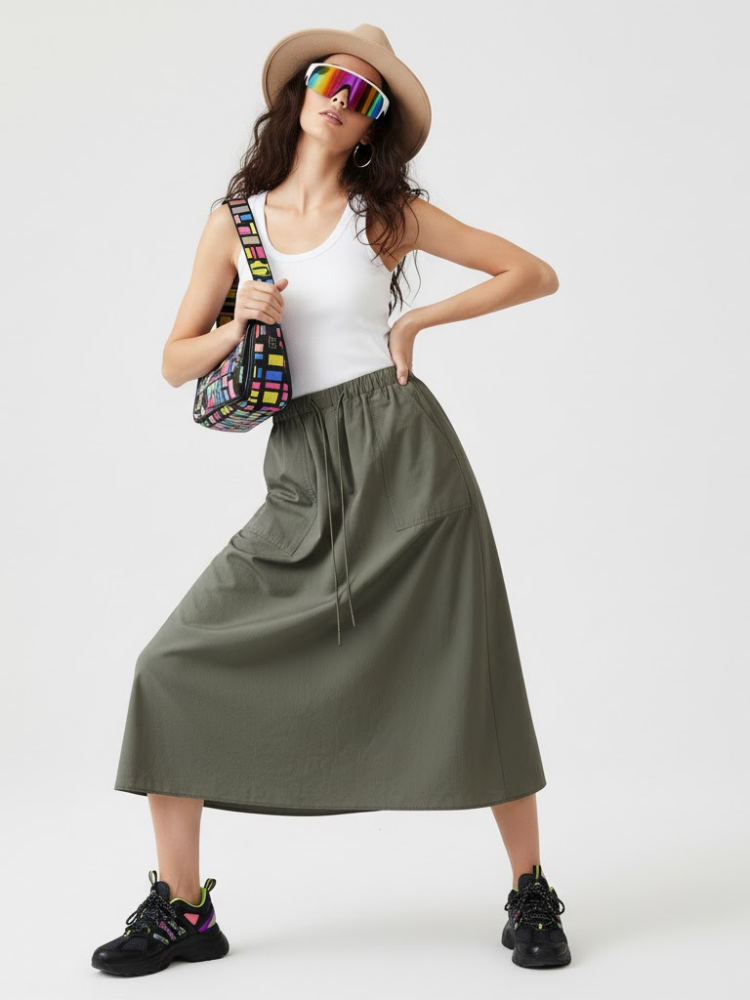 Asymmetric plaid maxi skirt in green and black with utilitarian layered panels and metallic buckle — view 2