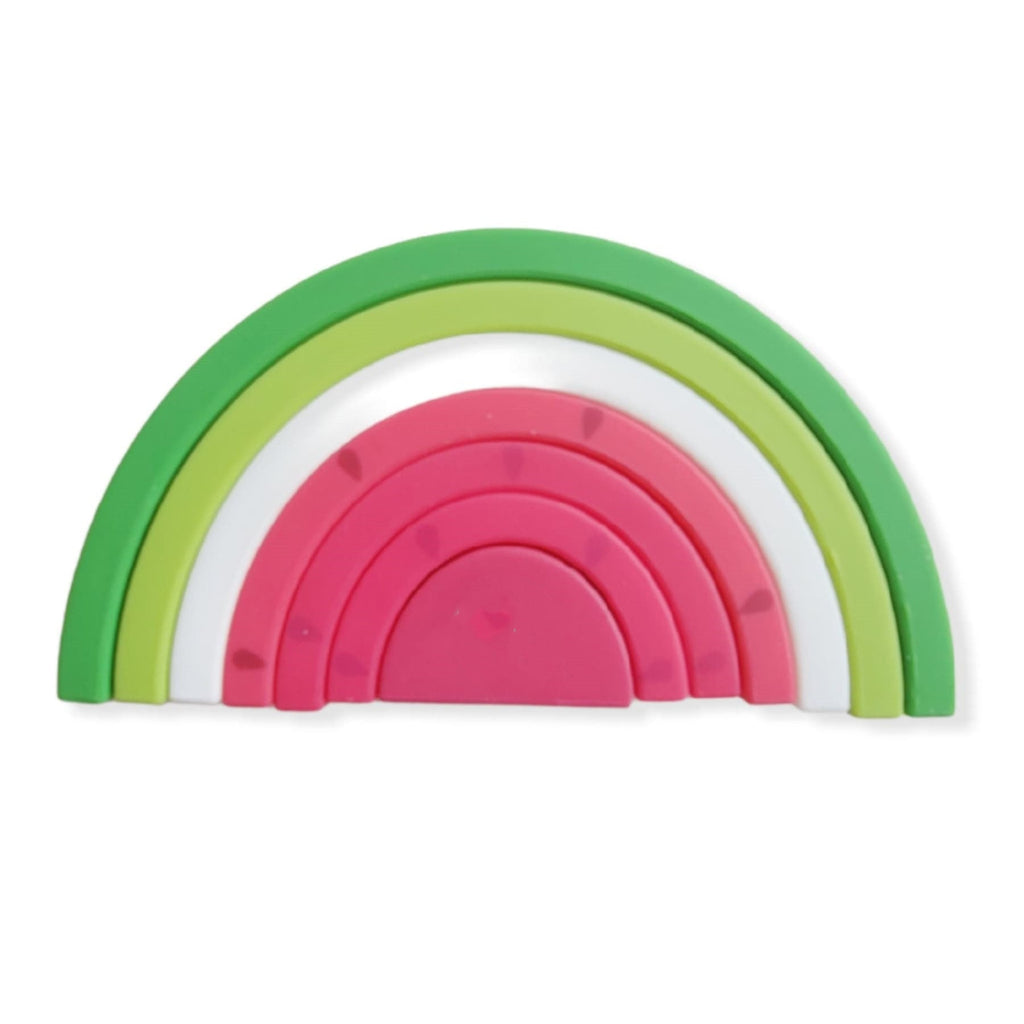 Silicone rainbow building blocks arranged in a watermelon shape for baby sensory and open-ended play