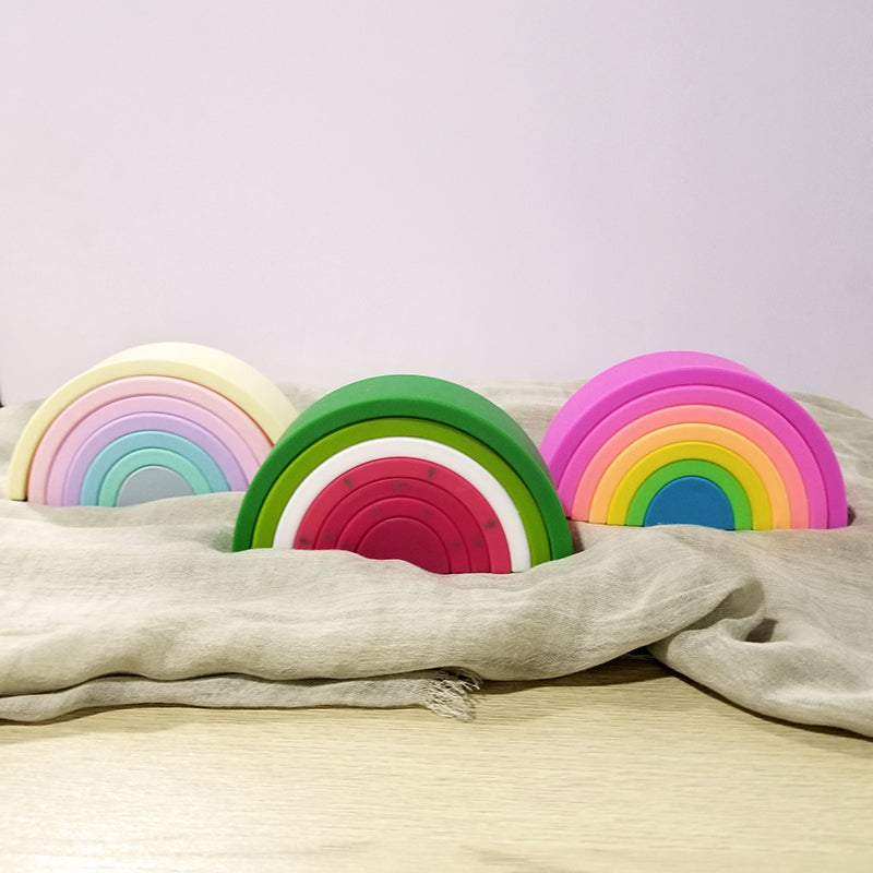 Silicone rainbow building blocks arranged in a watermelon shape for baby sensory and open-ended play — view 2