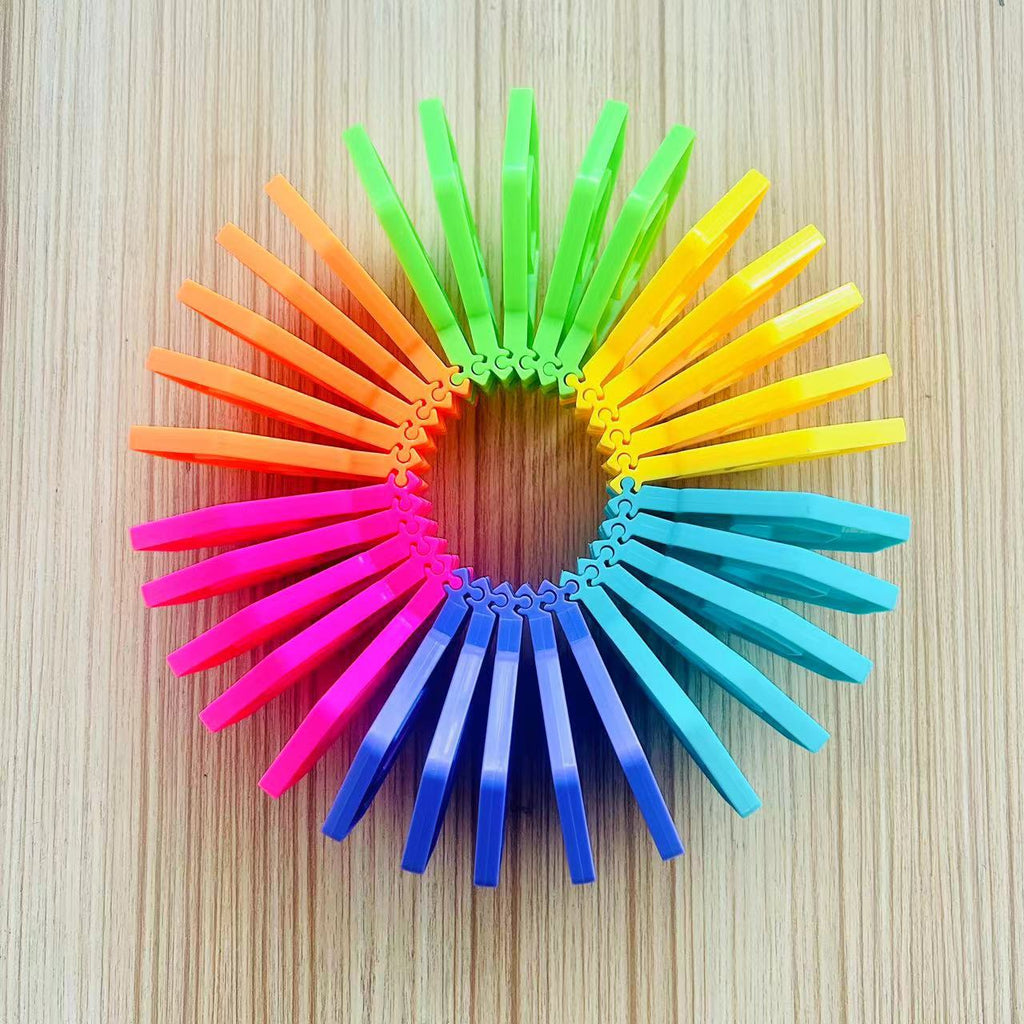 Rainbow stacking toy puzzle building blocks in colorful plastic pieces for children