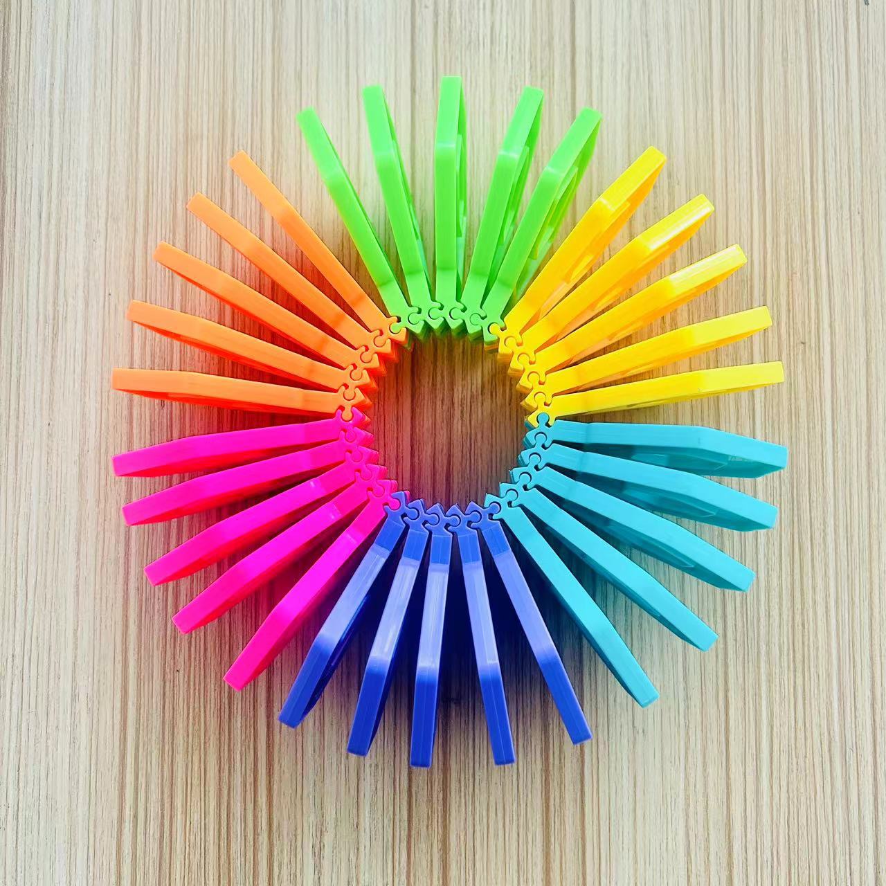 Rainbow stacking toy puzzle building blocks in colorful plastic pieces for children