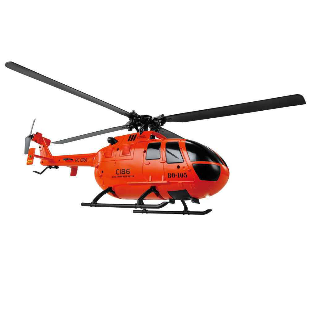 Orange and gray BO105 model remote control helicopter with remote and battery accessories — view 2