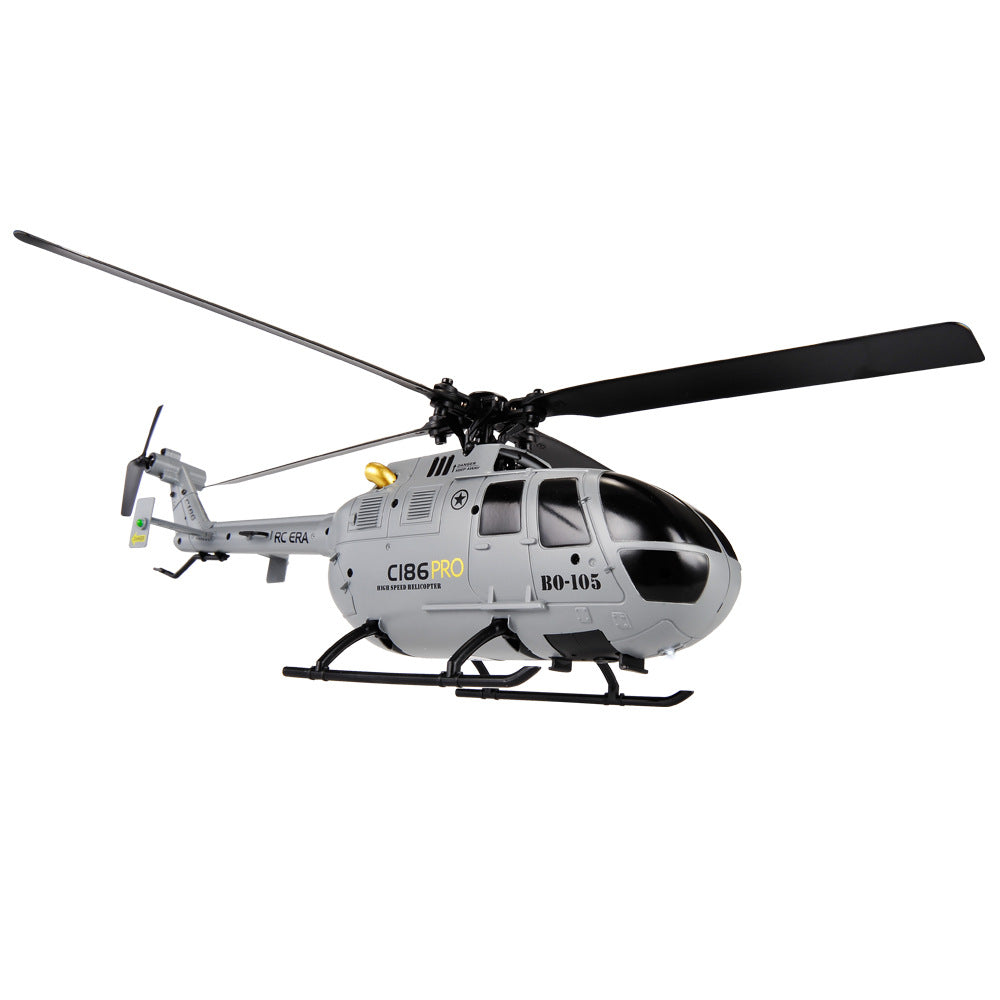 Orange and gray BO105 model remote control helicopter with remote and battery accessories — view 4