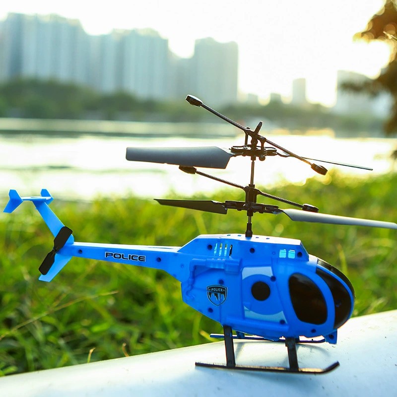 Kids remote control helicopter toy in colorful durable plastic with its infrared remote controller device — view 3